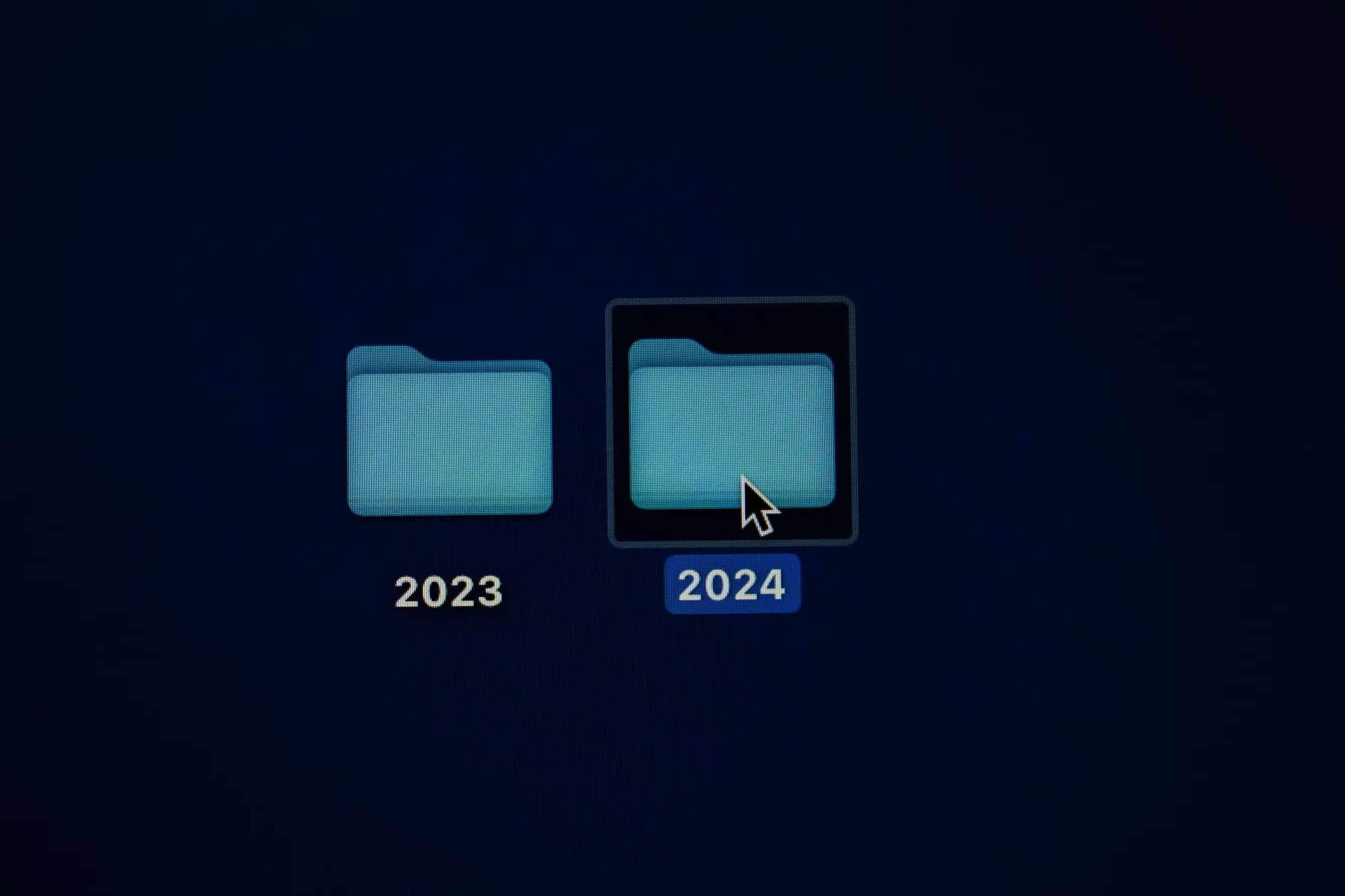 A 2023 folder and a 2024 folder, and 2024 folder about to be opened